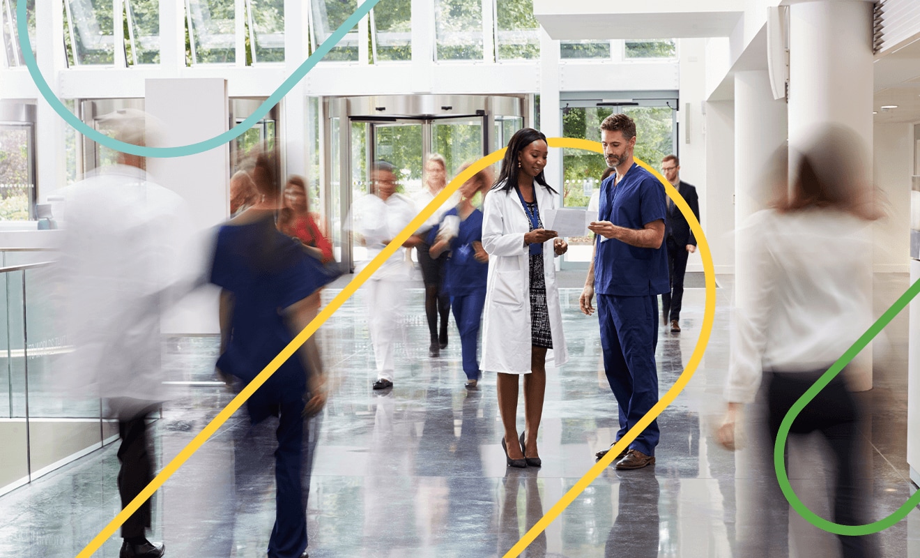 Doctor and nurse review documents